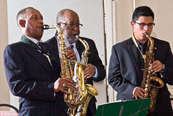 Saxophonists performing together